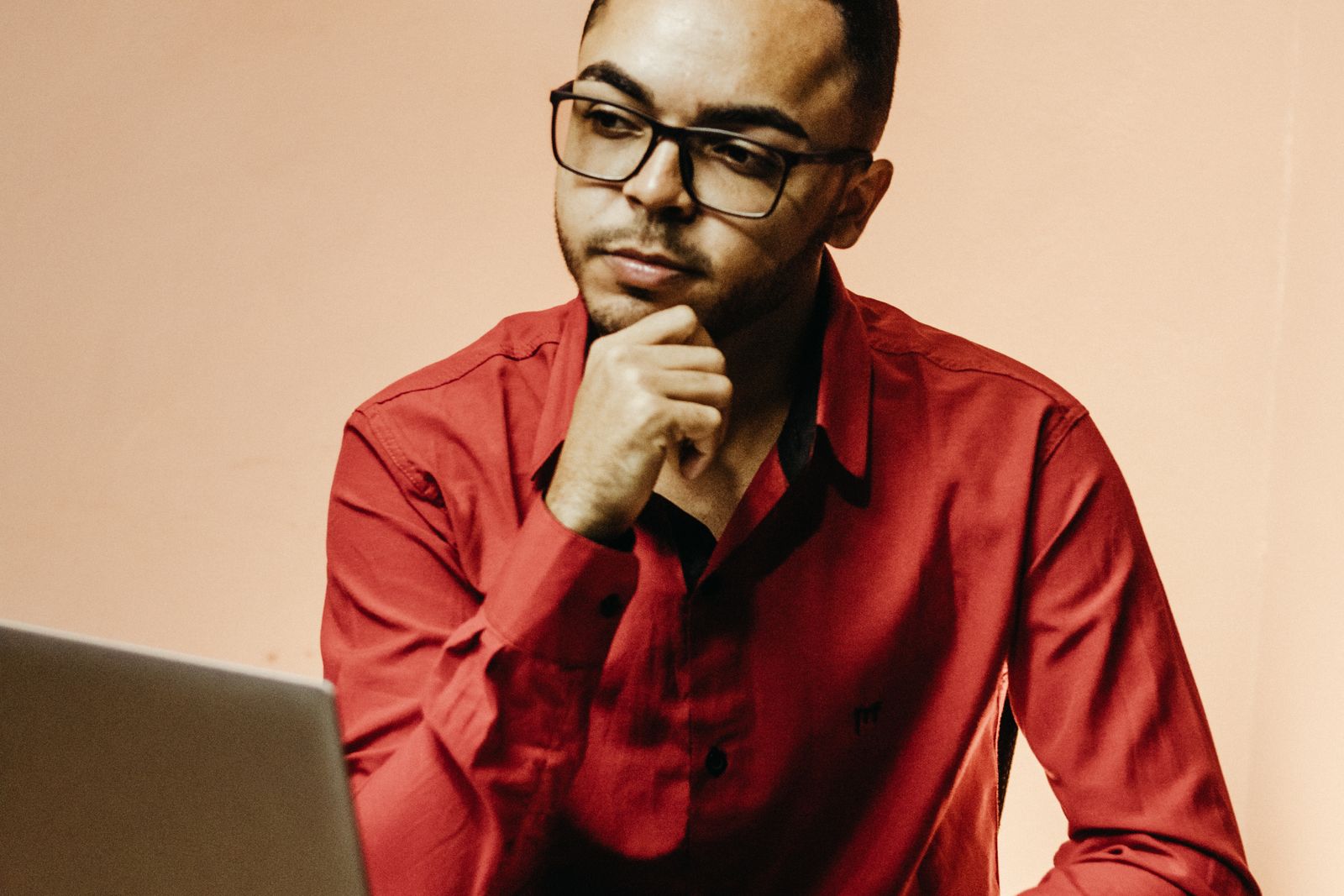 A person reviewing content on a laptop